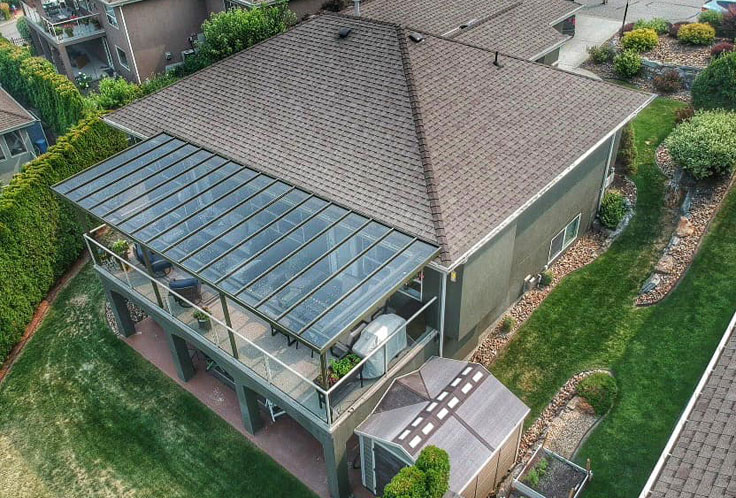 aerial of large sundeck glass top patio cover