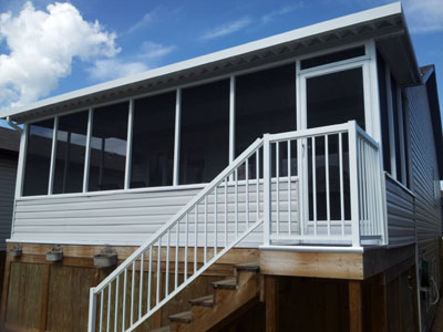 screen room with partial vinyl siding